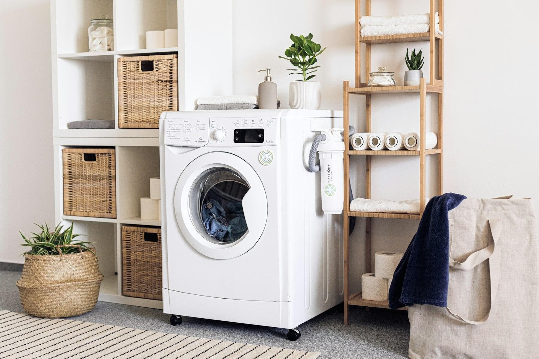 Washing machine in a bright laundry corner